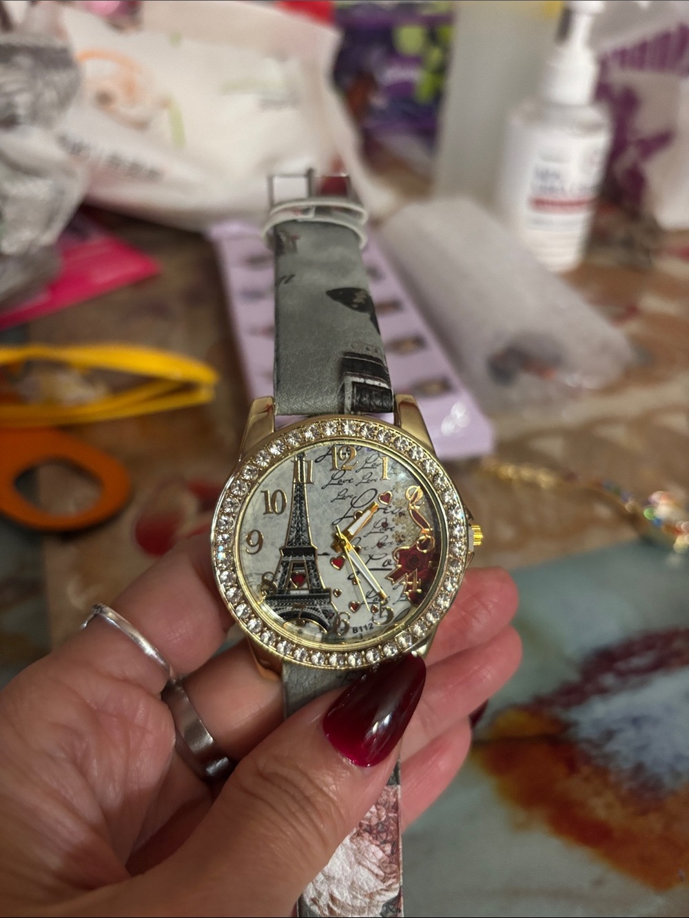 Gold Crystal Eiffel Tower Accent Women's Watch - Gray Strap
